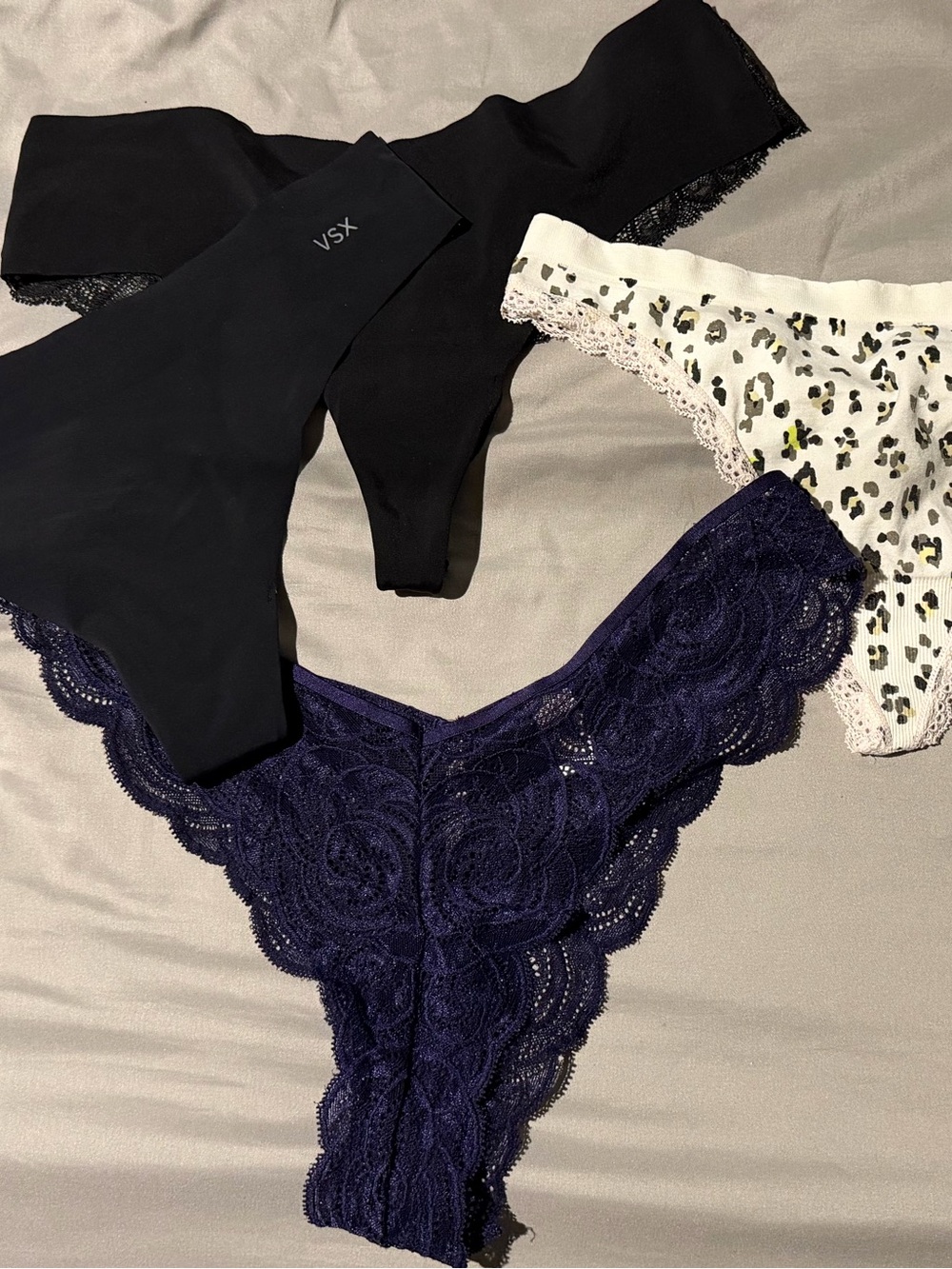 Victoria's Secret 4-Pack Thong Set - Black, White Leopard, Navy Lace